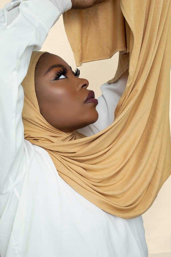 Close-up of a woman's profile wearing the instant premium jersey hijab, showcasing its soft and lightweight fabric